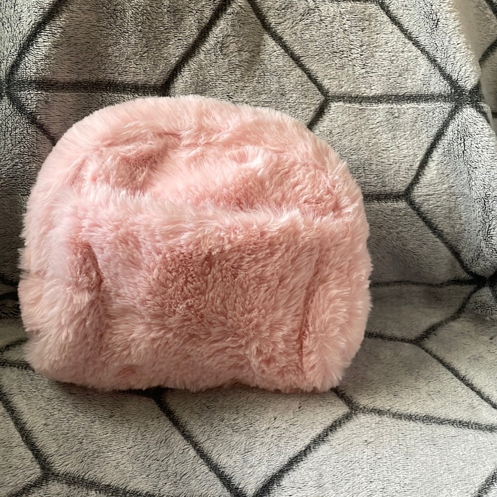 Blush colored furry bag